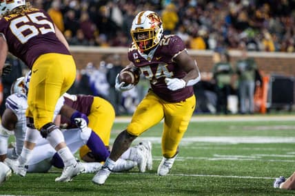 Nov 12, 2022; Minneapolis, Minnesota, USA; Minnesota Golden Gophers running back Mohamed Ibrahim (24) runs the ball against the Northwestern Wildcats during the third quarter at Huntington Bank Stadium. Mandatory Credit: Matt Krohn-USA TODAY Sports