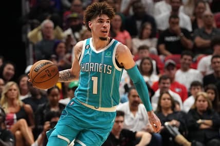 Nov 12, 2022; Miami, Florida, USA; Charlotte Hornets guard LaMelo Ball (1) controls the ball against the Miami Heat during the first half at FTX Arena. Mandatory Credit: Jasen Vinlove-USA TODAY Sports