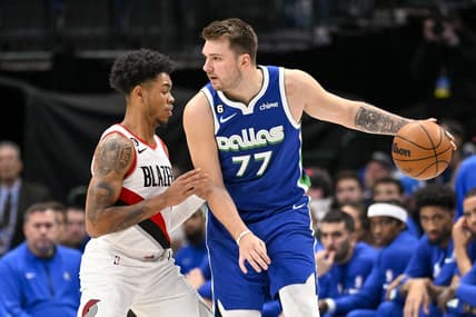 Nov 12, 2022; Dallas, Texas, USA; Portland Trail Blazers guard Anfernee Simons (1) guards Dallas Mavericks guard Luka Doncic (77) during the first quarter at the American Airlines Center. Mandatory Credit: Jerome Miron-USA TODAY Sports