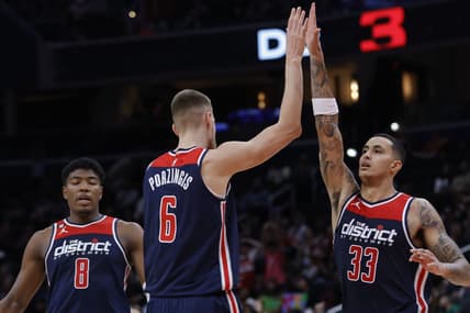 Nov 12, 2022; Washington, District of Columbia, USA; Washington Wizards center Kristaps Porzingis (6) celebrates with Wizards forward Kyle Kuzma (33) against the Utah Jazz in the fourth quarter at Capital One Arena. Mandatory Credit: Geoff Burke-USA TODAY Sports