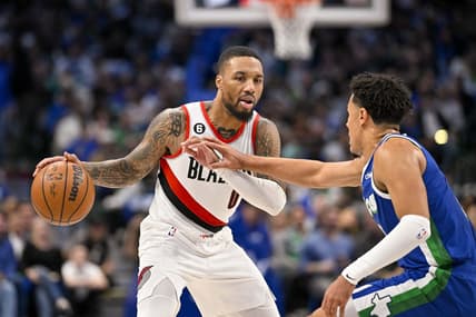 Nov 12, 2022; Dallas, Texas, USA; Dallas Mavericks guard Josh Green (8) guards Portland Trail Blazers guard Damian Lillard (0) during the second quarter at the American Airlines Center. Mandatory Credit: Jerome Miron-USA TODAY Sports