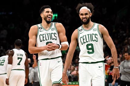 Nov 14, 2022; Boston, Massachusetts, USA; Boston Celtics forward Jayson Tatum (0) and guard Derrick White (9) react after defeating the Oklahoma City Thunder at the TD Garden. Mandatory Credit: Brian Fluharty-USA TODAY Sports