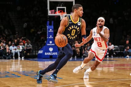 Oct 29, 2022; Brooklyn, New York, USA;  Indiana Pacers guard Tyrese Haliburton (0) and Brooklyn Nets guard Patty Mills (8) at Barclays Center. Mandatory Credit: Wendell Cruz-USA TODAY Sports