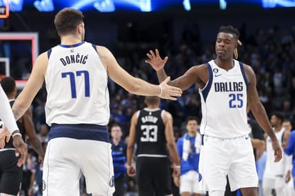 Nov 15, 2022; Dallas, Texas, USA;  Dallas Mavericks guard Luka Doncic (77) celebrates with Dallas Mavericks forward Reggie Bullock (25) after the game against the LA Clippers at American Airlines Center. Mandatory Credit: Kevin Jairaj-USA TODAY Sports