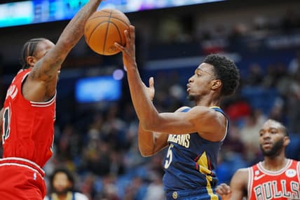 Nov 16, 2022; New Orleans, Louisiana, USA; New Orleans Pelicans forward Herbert Jones (5) attempts to pass the ball against Chicago Bulls forward DeMar DeRozan (11) during the first quarter at Smoothie King Center. Mandatory Credit: Andrew Wevers-USA TODAY Sports