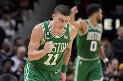 Nov 16, 2022; Atlanta, Georgia, USA; Boston Celtics guard Payton Pritchard (11) reacts after making a three point basket against the Atlanta Hawks during the second half at State Farm Arena. Mandatory Credit: Dale Zanine-USA TODAY Sports