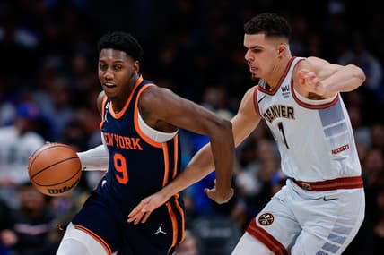 Nov 16, 2022; Denver, Colorado, USA; New York Knicks guard RJ Barrett (9) controls the ball against Denver Nuggets forward Michael Porter Jr. (1) in the third quarter at Ball Arena. Mandatory Credit: Isaiah J. Downing-USA TODAY Sports