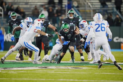 Nov 17, 2022; New Orleans, Louisiana, USA; Tulane Green Wave quarterback Michael Pratt (7) runs the ball against the Southern Methodist Mustangs during the first half at Yulman Stadium. Mandatory Credit: Andrew Wevers-USA TODAY Sports