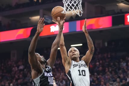 November 17, 2022; Sacramento, California, USA;  San Antonio Spurs forward Jeremy Sochan (10) shoots the basketball against Sacramento Kings forward Harrison Barnes (40) during the first quarter at Golden 1 Center. Mandatory Credit: Kyle Terada-USA TODAY Sports