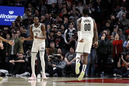 Nov 17, 2022; Portland, Oregon, USA; Brooklyn Nets power forward Royce O'Neale (00) reacts after a shot during the second half against the Portland Trail Blazers at Moda Center. Mandatory Credit: Soobum Im-USA TODAY Sports