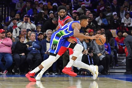 Nov 18, 2022; Philadelphia, Pennsylvania, USA; Milwaukee Bucks forward Giannis Antetokounmpo (34) drives to the basket past Philadelphia 76ers center Joel Embiid (21) during the first quarter at Wells Fargo Center. Mandatory Credit: Eric Hartline-USA TODAY Sports