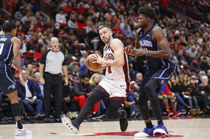 Nov 18, 2022; Chicago, Illinois, USA; Chicago Bulls guard Goran Dragic (7) drives to the basket against Orlando Magic center Mo Bamba (11) during the first half at United Center. Mandatory Credit: Kamil Krzaczynski-USA TODAY Sports