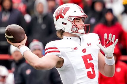 Nov 19, 2022; Lincoln, Nebraska, USA; Wisconsin Badgers quarterback Graham Mertz (5) throws a pass against the Nebraska Cornhuskers during the second quarter at Memorial Stadium. Mandatory Credit: Dylan Widger-USA TODAY Sports