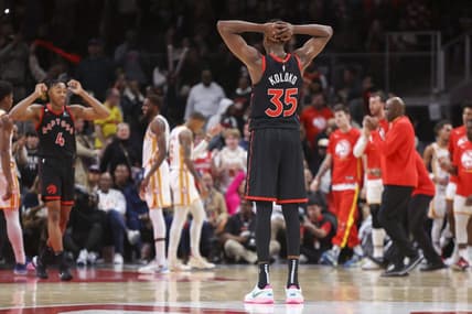 Nov 19, 2022; Atlanta, Georgia, USA; Toronto Raptors forward Christian Koloko (35) reacts against the Atlanta Hawks in the second half at State Farm Arena. Mandatory Credit: Brett Davis-USA TODAY Sports