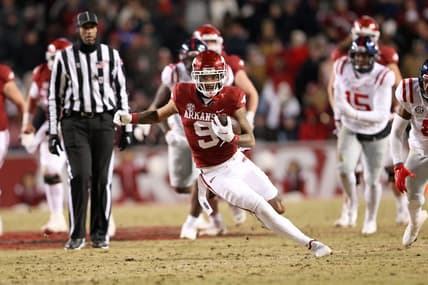 Nov 19, 2022; Fayetteville, Arkansas, USA; Arkansas Razorbacks wide receiver Jadon Haselwood (9) runs after a catch in the second quarter against the Ole Miss Rebels at Donald W. Reynolds Razorback Stadium. Mandatory Credit: Nelson Chenault-USA TODAY Sports