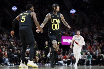 Nov 19, 2022; Portland, Oregon, USA; Utah Jazz point guard Jordan Clarkson (00) celebrates a basket with teammate Malik Beasley (5) during the second half against the Portland Trail Blazers at Moda Center. Mandatory Credit: Soobum Im-USA TODAY Sports