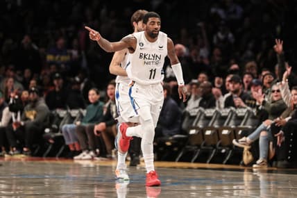 Nov 20, 2022; Brooklyn, New York, USA;  Brooklyn Nets guard Kyrie Irving (11) heads back down court after scoring in the first quarter against the Memphis Grizzlies at Barclays Center. Mandatory Credit: Wendell Cruz-USA TODAY Sports