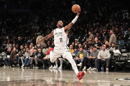Nov 20, 2022; Brooklyn, New York, USA;  Brooklyn Nets guard Kyrie Irving (11) catches an outlet pass in the third quarter against the Memphis Grizzlies at Barclays Center. Mandatory Credit: Wendell Cruz-USA TODAY Sports