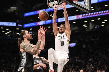 Nov 20, 2022; Brooklyn, New York, USA;  Brooklyn Nets guard Ben Simmons (10) dunks on Memphis Grizzlies center Steven Adams (4) in the third quarter at Barclays Center. Mandatory Credit: Wendell Cruz-USA TODAY Sports