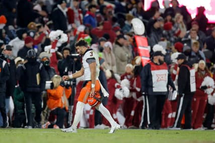 OSU's Spencer Sanders (3) walks off the field after an interception during a Bedlam college football game between the University of Oklahoma Sooners (OU) and the Oklahoma State University Cowboys (OSU) at Gaylord Family-Oklahoma Memorial Stadium in Norman, Okla., Saturday, Nov. 19, 2022. Oklahoma won 28-13.

osujournal -- print1