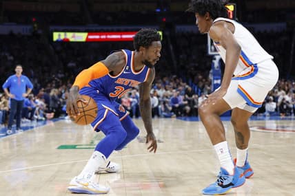 Nov 21, 2022; Oklahoma City, Oklahoma, USA; New York Knicks forward Julius Randle (30) drives against Oklahoma City Thunder forward Jalen Williams (8) during the second quarter at Paycom Center. Mandatory Credit: Alonzo Adams-USA TODAY Sports