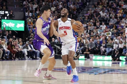Nov 23, 2022; Salt Lake City, Utah, USA;  Detroit Pistons guard Alec Burks (5) is fouled by Utah Jazz forward Simone Fontecchio (16) during the second quarter at Vivint Arena. Mandatory Credit: Chris Nicoll-USA TODAY Sports