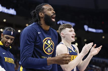Nov 23, 2022; Oklahoma City, Oklahoma, USA; Denver Nuggets center DeAndre Jordan (6) and guard Christian Braun (0) watch their team play against the Oklahoma City Thunder during the second half at Paycom Center. Denver won 131-126 during overtime. Mandatory Credit: Alonzo Adams-USA TODAY Sports