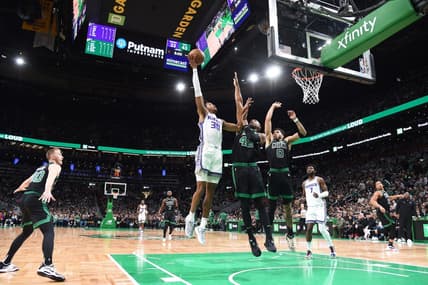 Nov 25, 2022; Boston, Massachusetts, USA;  Sacramento Kings forward KZ Okpala (30) shoots the ball over Boston Celtics center Al Horford (42) during the first half at TD Garden. Mandatory Credit: Bob DeChiara-USA TODAY Sports