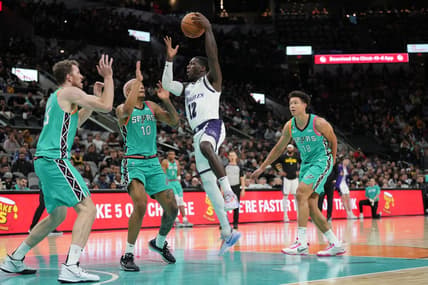 Nov 25, 2022; San Antonio, Texas, USA; Los Angeles Lakers guard Kendrick Nunn (12) passes the ball over San Antonio Spurs forward Jeremy Sochan (10) in the first half at the AT&T Center. Mandatory Credit: Daniel Dunn-USA TODAY Sports