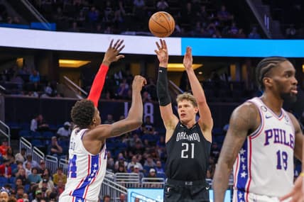Nov 25, 2022; Orlando, Florida, USA; Orlando Magic center Moritz Wagner (21) shoots the ball over Philadelphia 76ers forward Paul Reed (44) during the second half at Amway Center. Mandatory Credit: Mike Watters-USA TODAY Sports