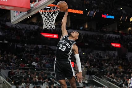 Nov 26, 2022; San Antonio, Texas, USA;  San Antonio Spurs guard Tre Jones (33) goes up for a dunk in the second half against the Los Angeles Lakers at the AT&T Center. Mandatory Credit: Daniel Dunn-USA TODAY Sports