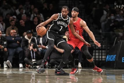 Nov 27, 2022; Brooklyn, New York, USA; Brooklyn Nets forward Kevin Durant (7) looks to spin away from Portland Trail Blazers guard Josh Hart (11) in the first quarter at Barclays Center. Mandatory Credit: Wendell Cruz-USA TODAY Sports