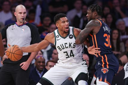 Nov 30, 2022; New York, New York, USA; Milwaukee Bucks forward Giannis Antetokounmpo (34) dribbles against New York Knicks forward Julius Randle (30) during the first half at Madison Square Garden. Mandatory Credit: Vincent Carchietta-USA TODAY Sports