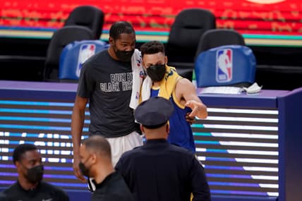 Golden State Warriors' Kevin Durant and Stephen Curry