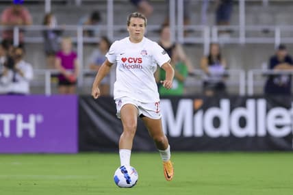 Aug 5, 2022; Louisville, Kentucky, USA; Washington Spirit defender Amber Brooks (22) controls the ball against Racing Louisville FC at Lynn Family Stadium. Mandatory Credit: Aaron Doster-USA TODAY Sports