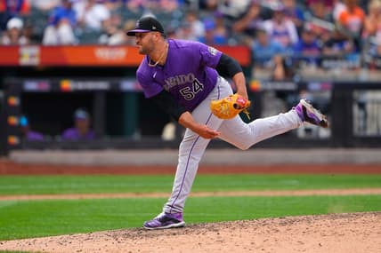Aug 28, 2022; New York City, New York, USA; Colorado Rockies pitcher Carlos Estevez (54) delivers a pitch against the New York Mets during the eighth inning at Citi Field. Mandatory Credit: Gregory Fisher-USA TODAY Sports