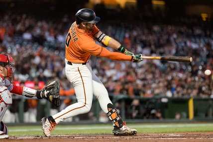 Sep 2, 2022; San Francisco, California, USA; San Francisco Giants third baseman Evan Longoria (10) hits an RBI line drive double against the Philadelphia Phillies during the first inning at Oracle Park. Mandatory Credit: John Hefti-USA TODAY Sports