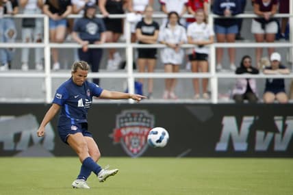 Sep 10, 2022; Washington, District of Columbia, USA; Washington Spirit defender Amber Brooks (22) crosses against San Diego Wave FC in the first half at Audi Field. Mandatory Credit: Amber Searls-USA TODAY Sports