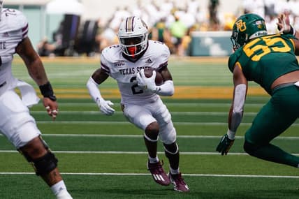 Sep 17, 2022; Waco, Texas, USA;  Texas State Bobcats wide receiver Ashtyn Hawkins (2) runs against Baylor Bears linebacker Garmon Randolph (55) during the first half at McLane Stadium. Mandatory Credit: Chris Jones-USA TODAY Sports
