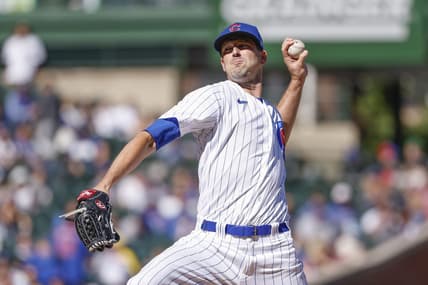 Oct 1, 2022; Chicago, Illinois, USA; Chicago Cubs starting pitcher Drew Smyly (11) delivers against the Cincinnati Reds during the first inning at Wrigley Field. Mandatory Credit: Kamil Krzaczynski-USA TODAY Sports