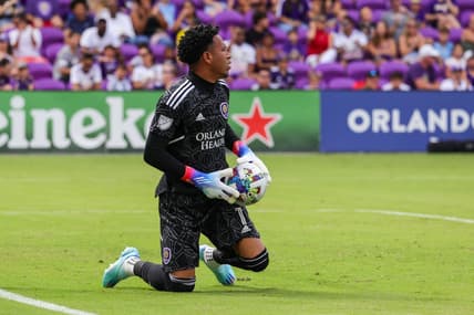 Oct 9, 2022; Orlando, Florida, USA; Orlando City goalkeeper Pedro Gallese (1) makes a save during the first half against the Columbus Crew at Exploria Stadium. Mandatory Credit: Mike Watters-USA TODAY Sports