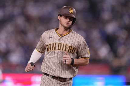 Oct 11, 2022; Los Angeles, California, USA; San Diego Padres right fielder Wil Myers (5) rounds the bases after hitting a home run during the fifth inning of game one of the NLDS for the 2022 MLB Playoffs against the Los Angeles Dodgers at Dodger Stadium. Mandatory Credit: Kirby Lee-USA TODAY Sports