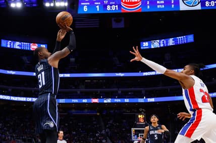 Oct 19, 2022; Detroit, Michigan, USA;  Orlando Magic guard Terrence Ross (31) shoots over Detroit Pistons guard Jaden Ivey (23) at Little Caesars Arena. Mandatory Credit: Rick Osentoski-USA TODAY Sports