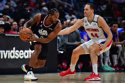 Nov 17, 2022; Los Angeles, California, USA; Los Angeles Clippers forward Kawhi Leonard (2) controls the ball against Detroit Pistons forward Bojan Bogdanovic (44) during the second half at Crypto.com Arena. Mandatory Credit: Gary A. Vasquez-USA TODAY Sports