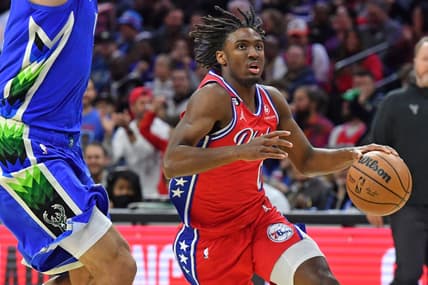 Nov 18, 2022; Philadelphia, Pennsylvania, USA; Philadelphia 76ers guard Tyrese Maxey (0) drives to the basket against Milwaukee Bucks center Brook Lopez (11)  during the first quarter at Wells Fargo Center. Mandatory Credit: Eric Hartline-USA TODAY Sports