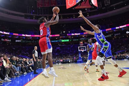 Nov 18, 2022; Philadelphia, Pennsylvania, USA; Philadelphia 76ers guard Tyrese Maxey (0) shoots over Milwaukee Bucks forward Giannis Antetokounmpo (34) during the second quarter at Wells Fargo Center. Mandatory Credit: Eric Hartline-USA TODAY Sports