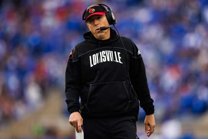 Nov 26, 2022; Lexington, Kentucky, USA; Louisville Cardinals head coach Scott Satterfield walks up the sideline during the first quarter against the Kentucky Wildcats at Kroger Field. Mandatory Credit: Jordan Prather-USA TODAY Sports