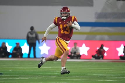 Dec 2, 2022; Las Vegas, NV, USA; Southern California Trojans quarterback Caleb Williams (13) carries the ball on a 59-yard run against the Utah Utes in the first half of the Pac-12 Championship at Allegiant Stadium. Mandatory Credit: Kirby Lee-USA TODAY Sports
