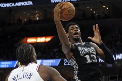 Dec 2, 2022; Memphis, Tennessee, USA; Memphis Grizzlies forward Jaren Jackson Jr. (13) collects a rebound during the second half against the Philadelphia 76ers at FedExForum. Mandatory Credit: Petre Thomas-USA TODAY Sports