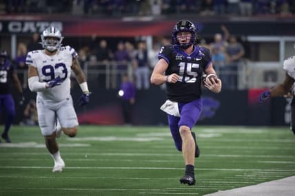 Dec 3, 2022; Arlington, TX, USA; TCU Horned Frogs quarterback Max Duggan (15) runs down the sidelines for a first down against the Kansas State Wildcats during the second half at AT&T Stadium. Mandatory Credit: Jerome Miron-USA TODAY Sports